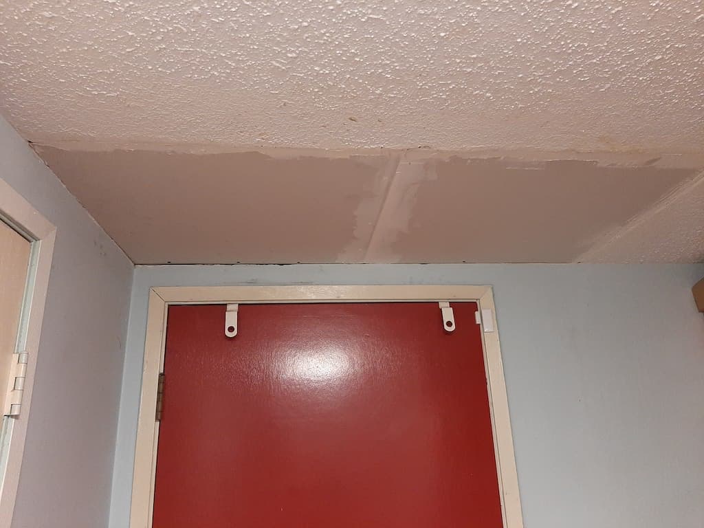 Ceiling drywall patch prepared for texture